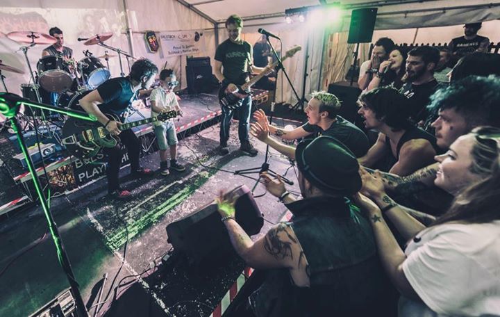 Crowd surfing. ‘Cos they need to start young.

Photo by Neil McCarty @ Balstock Music Festival.